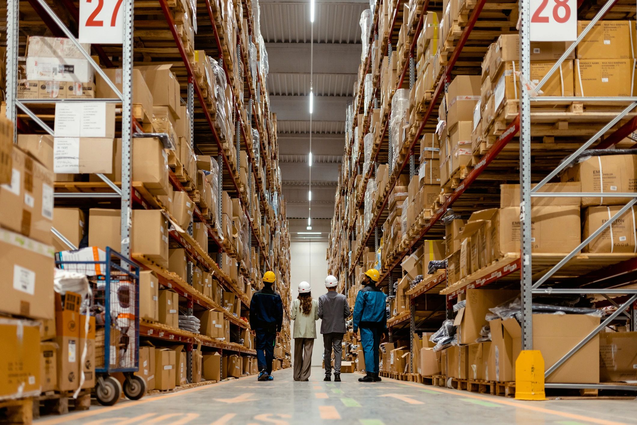 Warehouse leadership walking through inventory